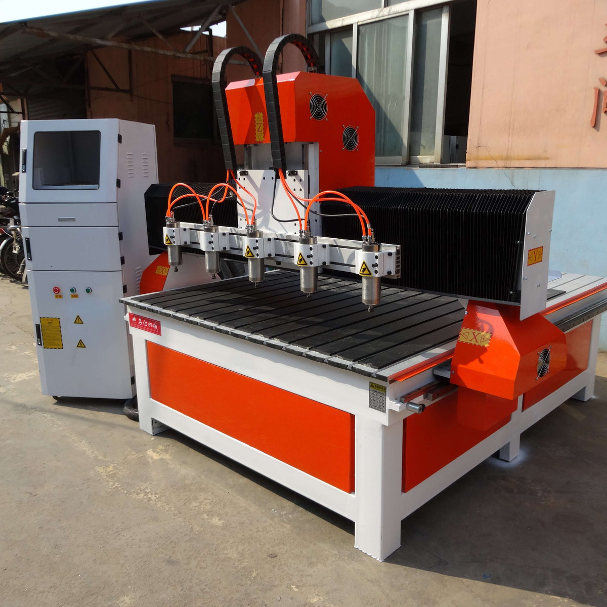 Precision Multi-Head 4-Axis CNC Router for 3D woodwork and mass production, featuring welded steel design for durability