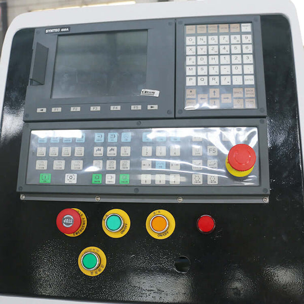 Syntec controller panel with display screen and numerous functional buttons for industrial machinery operation and control.