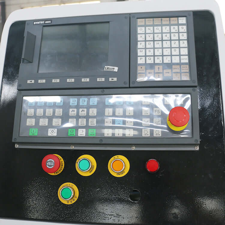 Syntec controller panel with display screen and numerous functional buttons for industrial machinery operation and control.