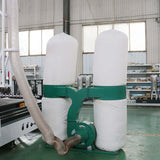 Industrial dust collection system in factory setting for woodworking machinery