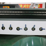 Close-up of controls on 4 Axis ATC CNC Router with 180° swing head for versatile woodworking, cutting, engraving, drilling.