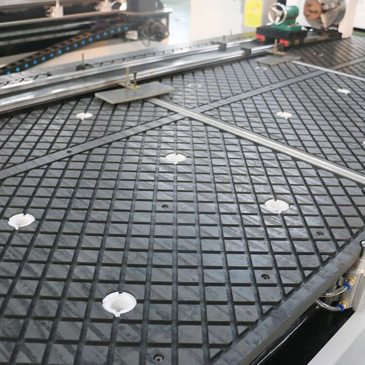 Close-up of a 4 Axis ATC CNC Router table, showcasing its industrial-grade build and precision features for woodworking and engraving.