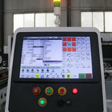 Control panel of 4 Axis ATC CNC Router with 180° swing head, featuring digital display and control buttons for woodworking precision.