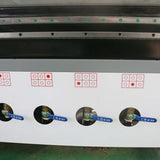 Close-up of 4 Axis ATC CNC Router control panel with adjustable levers for woodworking and furniture cutting.