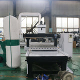 4 Axis ATC CNC Router with 180° Swing Head for versatile woodworking tasks in a manufacturing facility.