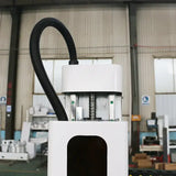 Close-up of 4 Axis CNC Router head for wood and 3D engraving in a workshop setting