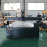 4 Axis CNC Router for 3D woodworking and cylinder engraving in workshop setting.