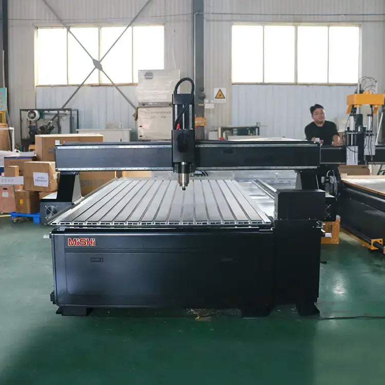 4 Axis CNC Router for 3D woodworking and cylinder engraving in workshop setting.