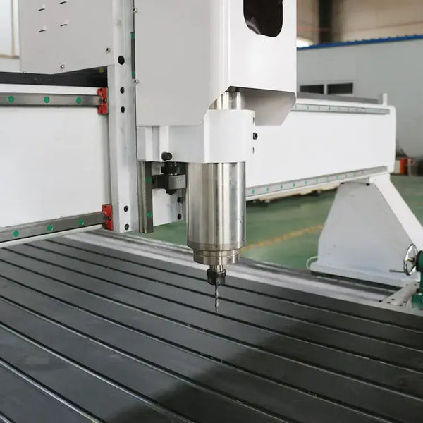 Close-up of 4 axis CNC router spindle for 3D woodworking and cylinder engraving operations.