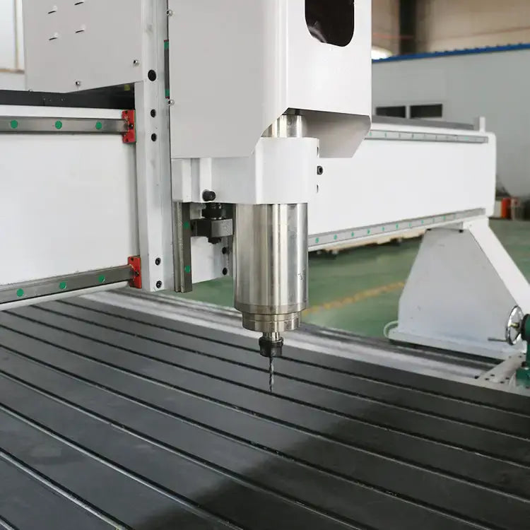 Close-up of 4 axis CNC router spindle for 3D woodworking and cylinder engraving operations.