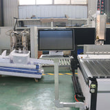 Customized 4-axis ATC CNC router with rotary axis and swing arm in a workshop setting.