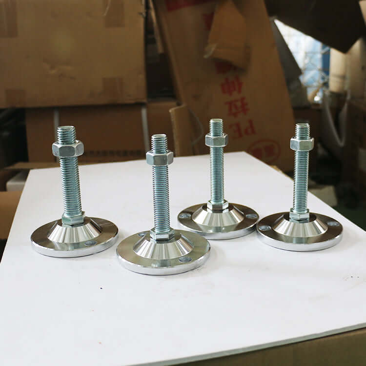 Adjustable metal frame feet with screws, ideal for stabilizing furniture or machinery, shown against a workshop backdrop.