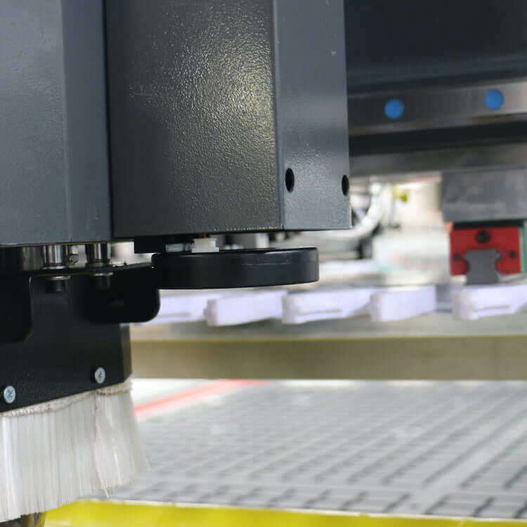 Close-up of ATC CNC Router with CCD Camera and Pressure Roller in operation, ideal for furniture industry cutting and engraving.