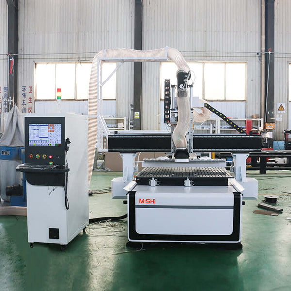 High-performance ATC CNC Router for cutting and engraving, ideal for furniture and cabinet making, in an industrial workshop setting.