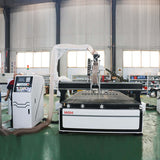 High-performance ATC CNC router for furniture and cabinet making, featuring cutting, engraving, and drilling capabilities.