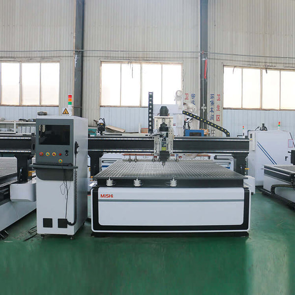 ATC CNC router in factory setting, ideal for furniture, cabinet, and door making with cutting, engraving, drilling capabilities