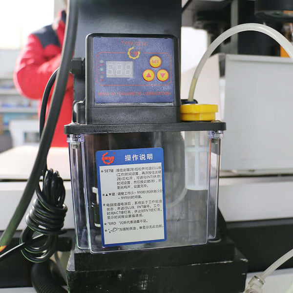 Oil lubrication system with control panel and instructions, ideal for machinery maintenance and efficient operation.