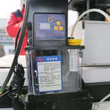 Oil lubrication system with control panel and instructions, ideal for machinery maintenance and efficient operation.