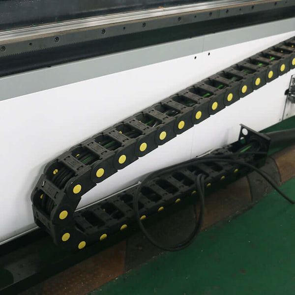 CNC router machine with oscillating knife for precise cutting, featuring a cable drag chain system, ideal for wood, fabric, and rubber.