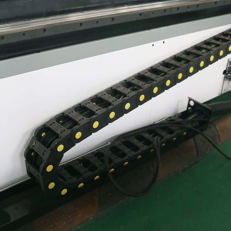 CNC router machine with oscillating knife for precise cutting, featuring a cable drag chain system, ideal for wood, fabric, and rubber.