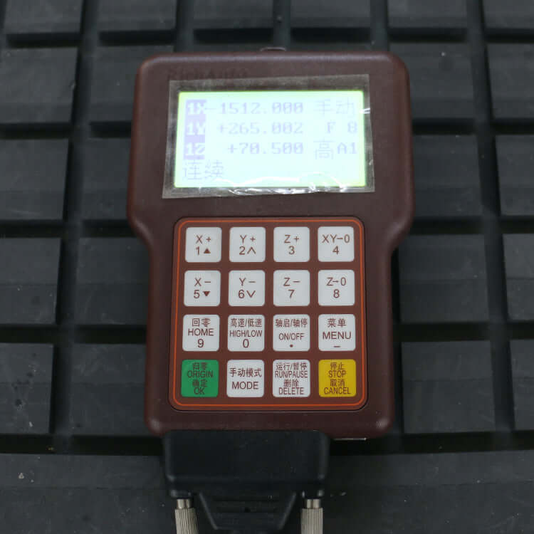 Handheld CNC router control panel displaying process settings and numeric inputs for precise woodworking operations.