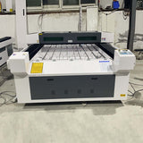 CO2 laser engraving machine for precise wood, acrylic, and MDF cutting, suitable for various industries.