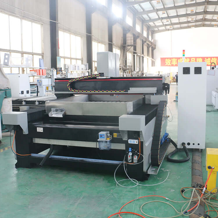 Industrial metal CNC router machine in a factory setting
