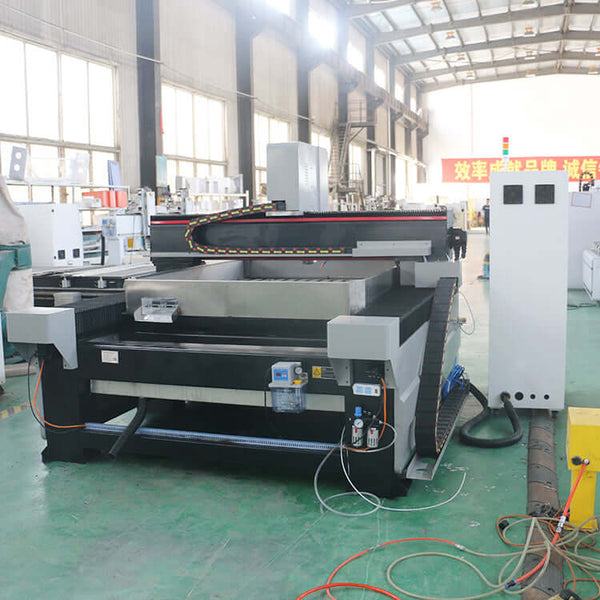 Industrial metal CNC router machine in a factory setting