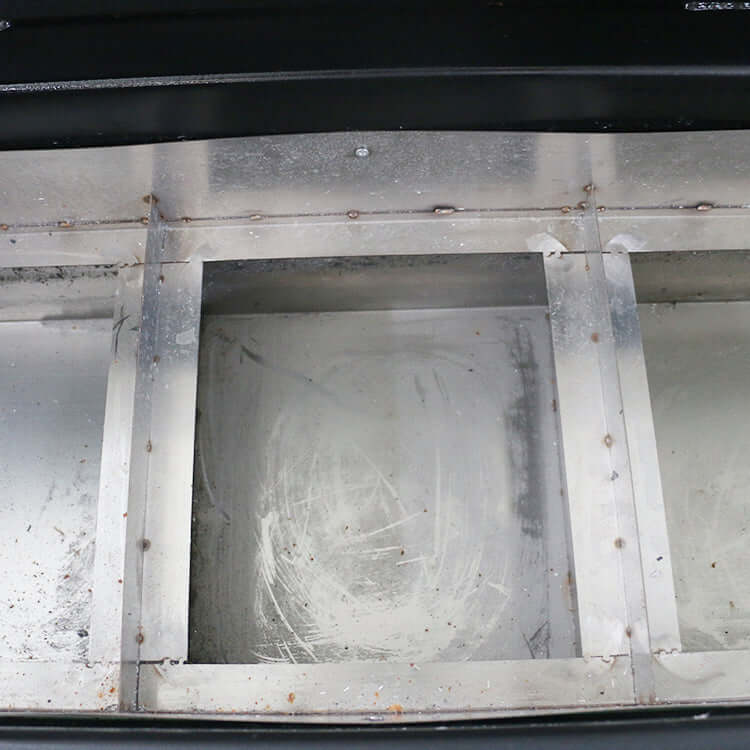 Interior view of a customized metal CNC router base showing structural components and machine finish.