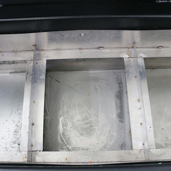 Interior view of a customized metal CNC router base showing structural components and machine finish.
