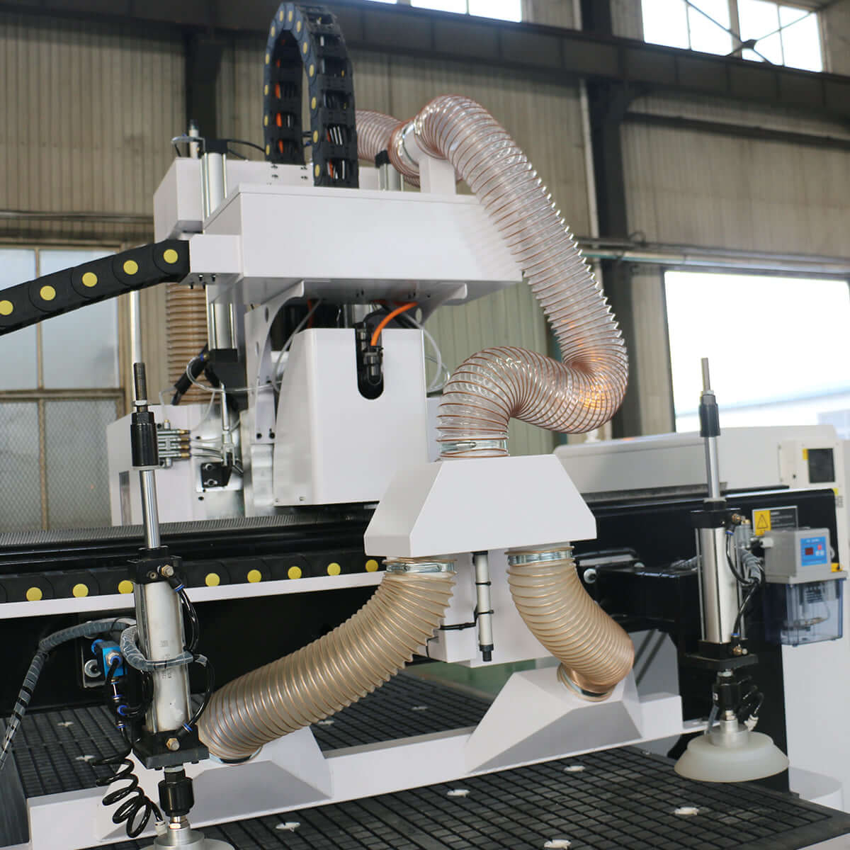 Efficient Auto-Loading ATC CNC Router for mass furniture production with high-speed spindle and automatic loading system.