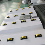 Auto-loading ATC CNC router with yellow wheels for efficient furniture production. Ideal for high-speed cabinet making.