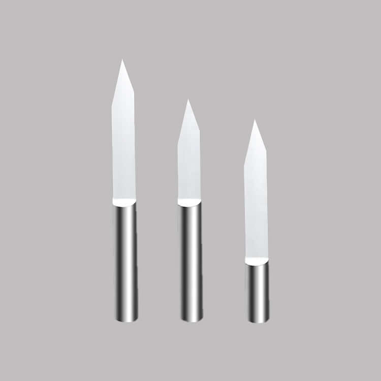 Set of three high-precision flat bottom end mills for cutting metal and wood with sharp edges.