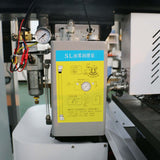 High-efficiency oil mist pump for precision lubrication in industrial machinery, featuring control panel and tubing connections.