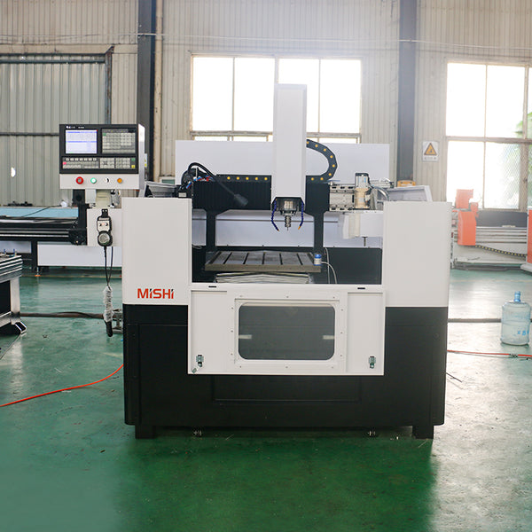 High-Precision Mini ATC CNC Router with disc tool changer in an industrial setting, featuring advanced control panel and robust design.