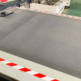 High-speed oscillating knife cutting machine for leather, rubber, and textiles, ideal for automotive industry applications.