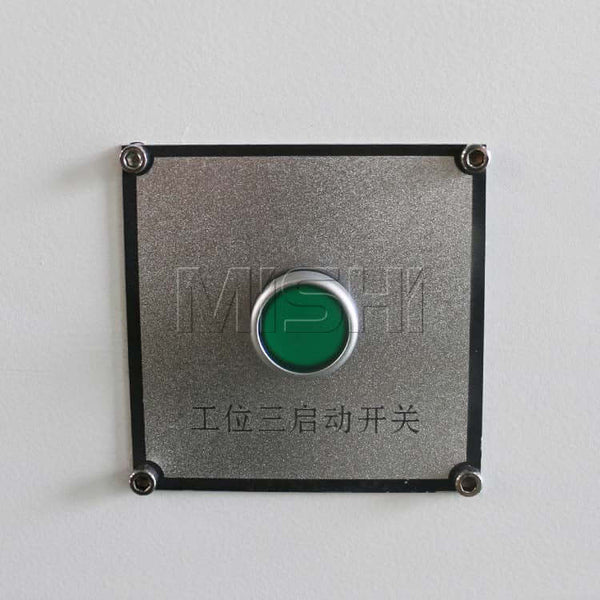 Green button on control panel of Precision CNC Side Hole Drilling Machine for Furniture production.
