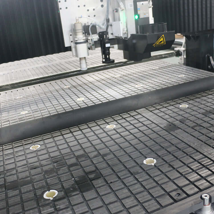 Industrial pressure roller machine in operation on a grid-patterned surface, highlighting precision engineering in manufacturing processes.