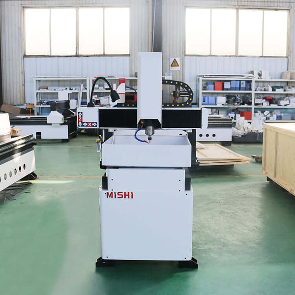 Mini metal CNC router for precision engraving and milling, ideal for mold processing on aluminum and stainless steel.