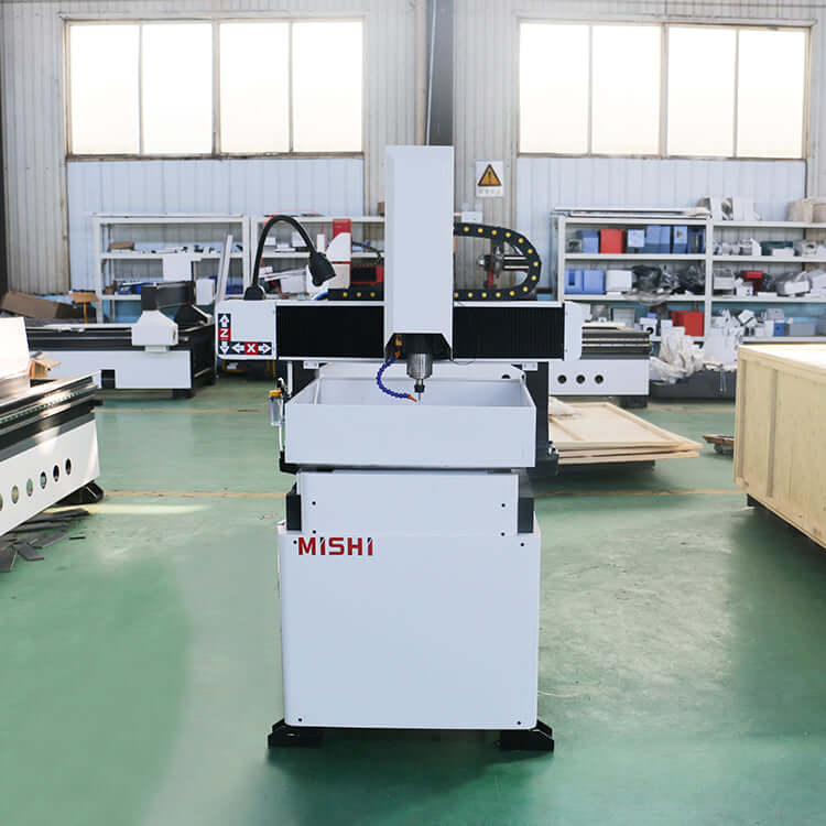 Mini metal CNC router for precision engraving and milling, ideal for mold processing on aluminum and stainless steel.