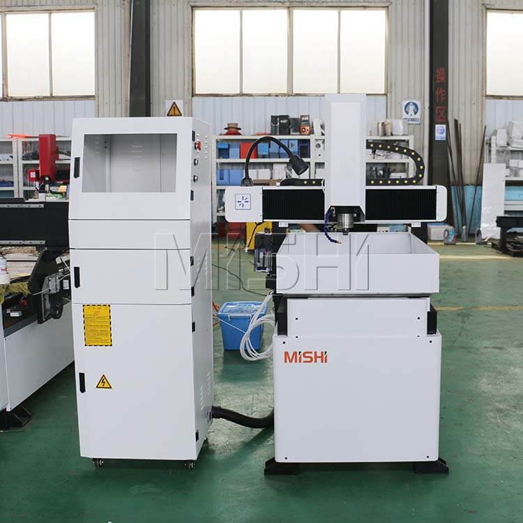 Mini Metal CNC Router for Precision Milling and Engraving in an industrial workshop setting