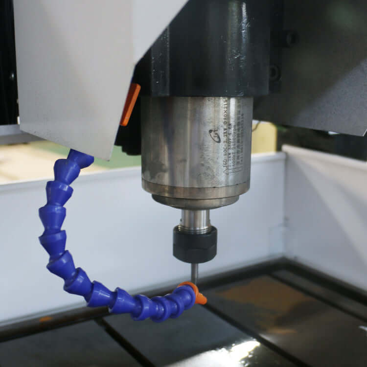 Close-up of a mini metal CNC router operating, suitable for precision milling and engraving on aluminum and copper materials.