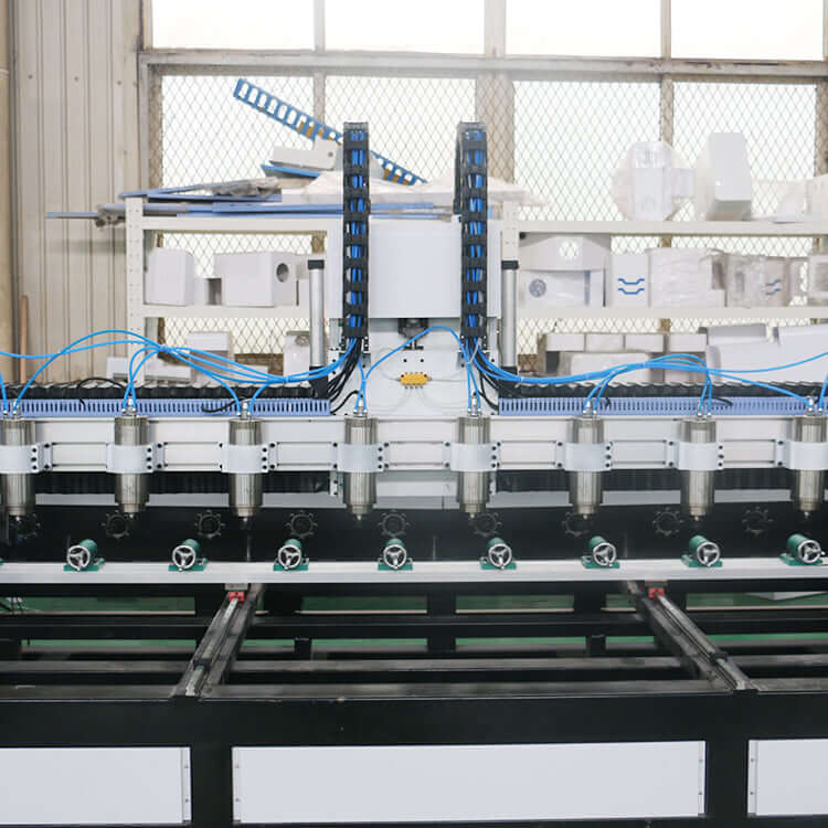 Multi-head 4-axis CNC router machine for precise 3D wood carving and mass production displayed in an industrial workshop.