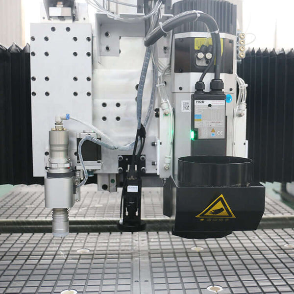 Close-up of a Multifunction ATC CNC Router with oscillating knife and CCD camera, used for cutting and engraving in furniture industry.