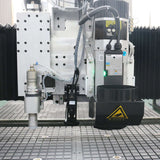 Close-up of a Multifunction ATC CNC Router with oscillating knife and CCD camera, used for cutting and engraving in furniture industry.