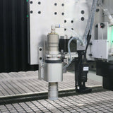 Close-up view of a multifunction ATC CNC router with oscillating knife and CCD camera, showcasing precision engineering for diverse materials.