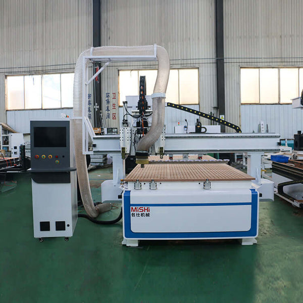 Multifunction ATC CNC Router with oscillating knife and CCD camera in an industrial setting for cutting and engraving various materials.