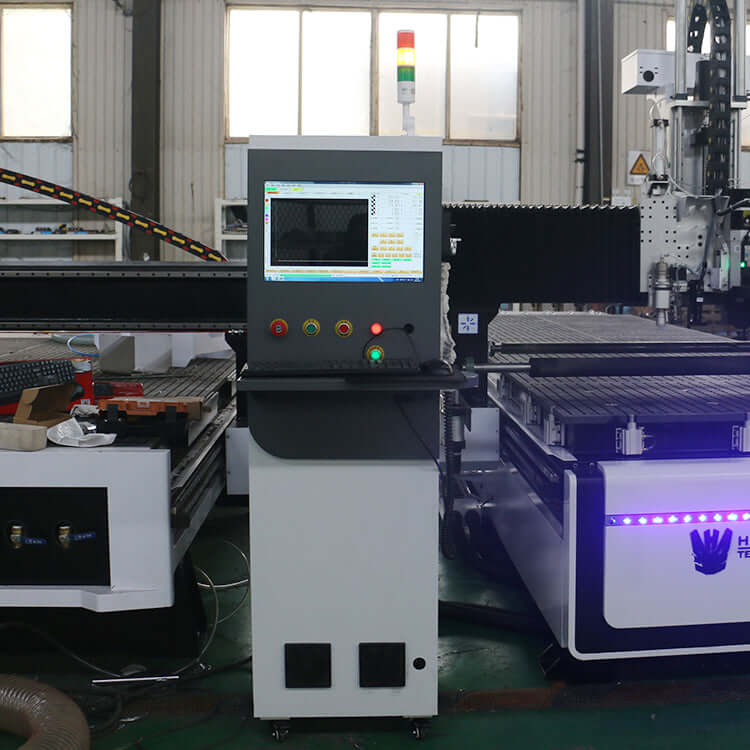 Multifunction ATC CNC Router with oscillating knife and CCD camera in a workshop setting for versatile material processing.