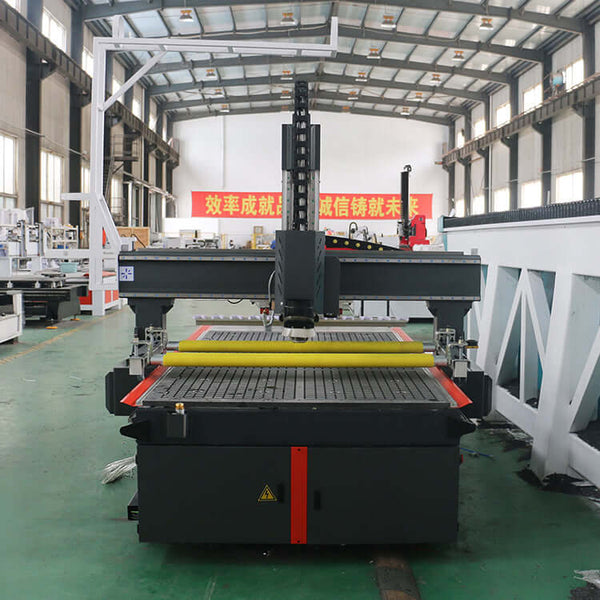 New Design ATC CNC Router with CCD Camera and Pressure Roller in a factory setting, ideal for cutting, engraving, drilling, and grooving.