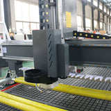 New Design ATC CNC Router with CCD Camera and Pressure Roller for versatile cutting in furniture manufacturing.